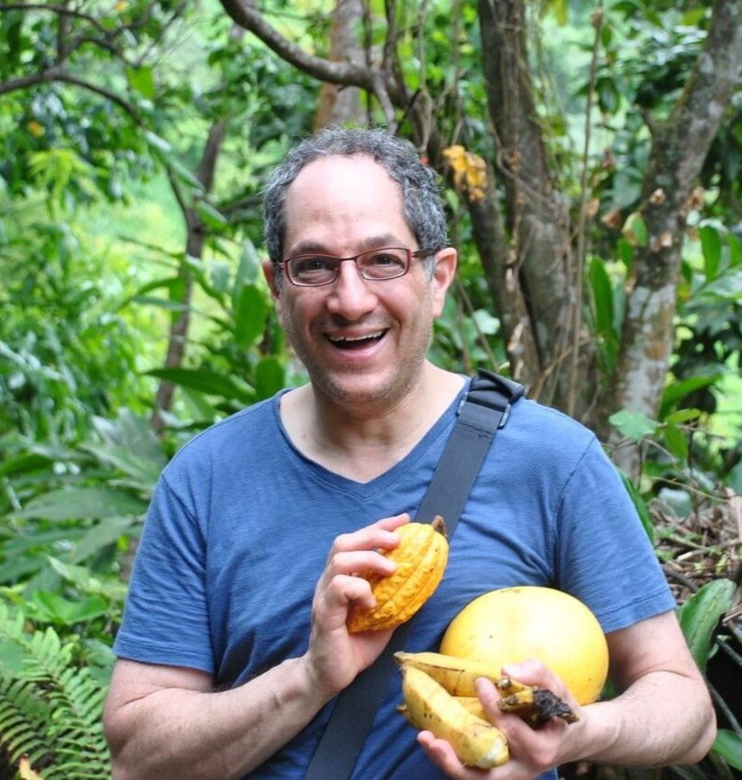 Richard Tango-Lowy holding cacao fruits