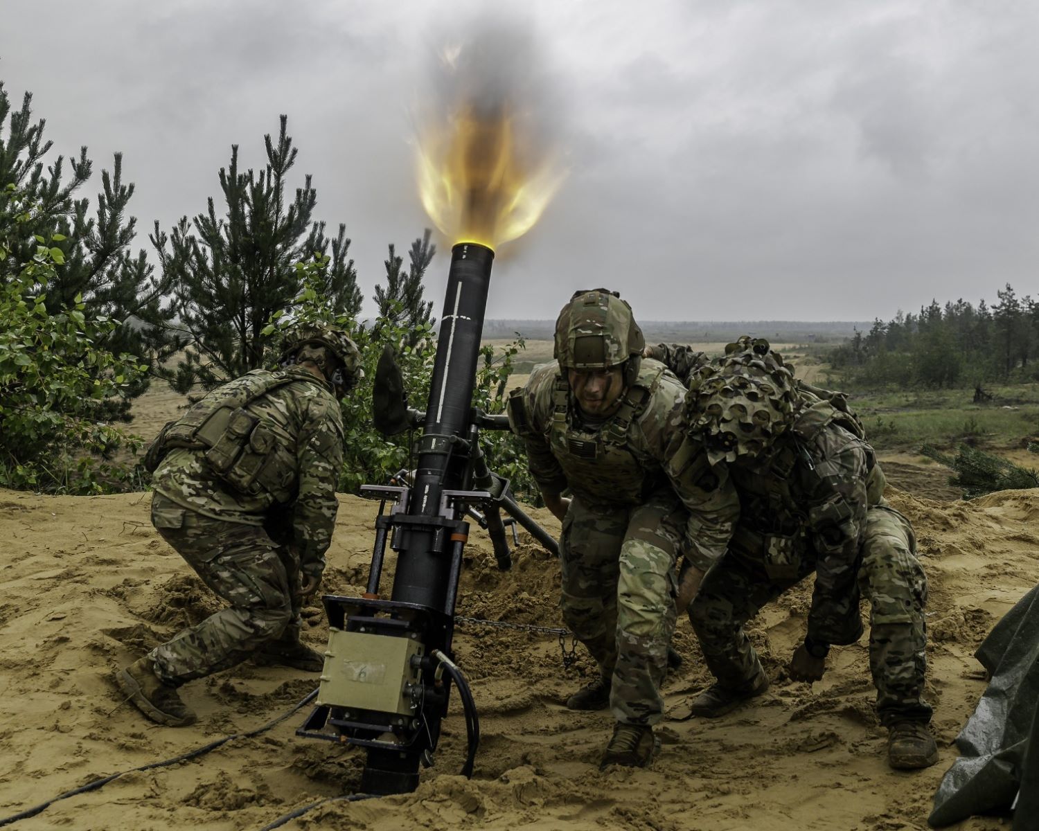 soldier fired an M120A1 120 mm towed mortar system