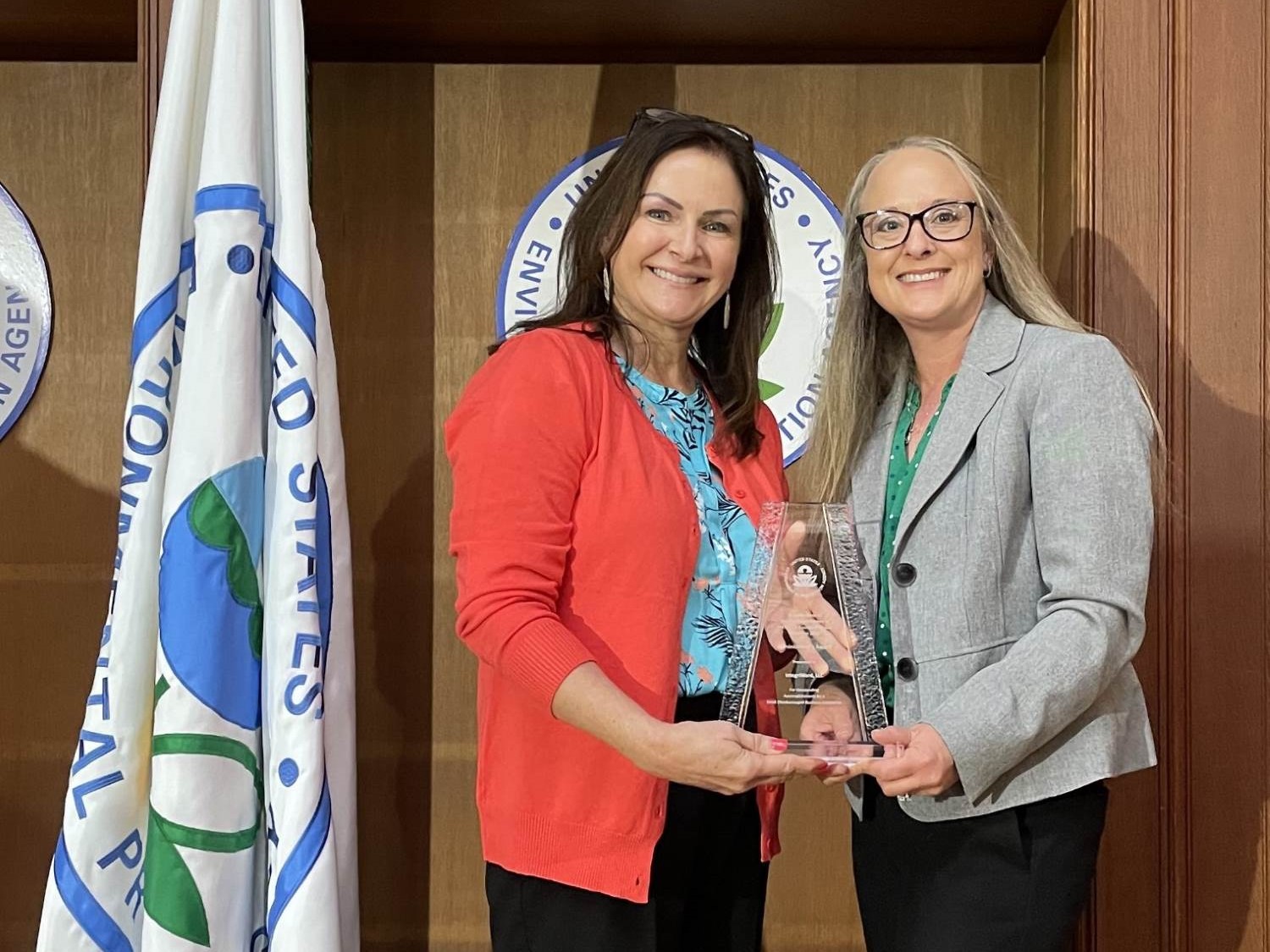 Diana Davis receives a trophy