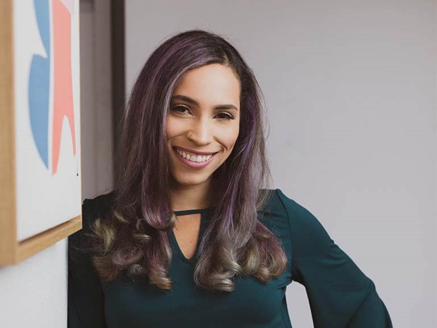 Ayanna McClintic leans against the wall