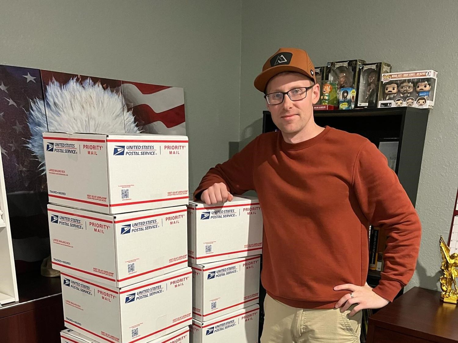 Derek James packs his books