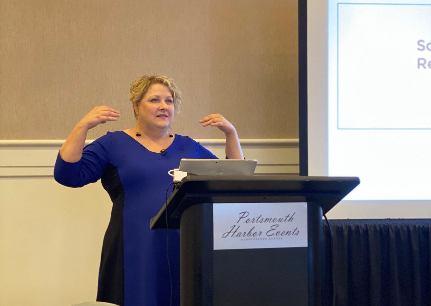 Lisa Rehurek speaks at a technical seminar