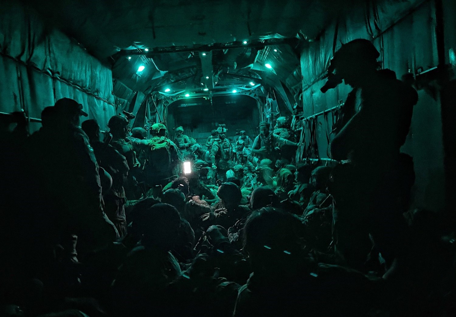 Vice Media reporter on a plane with marine