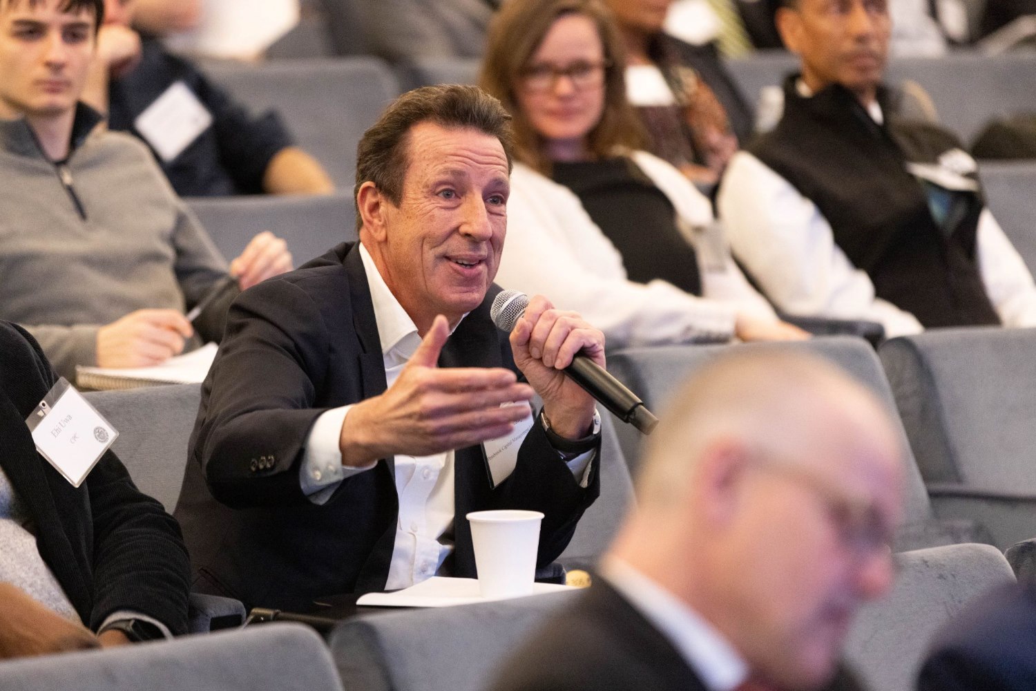 An attendee speaks in a Federal Reserve Bank of New York conference