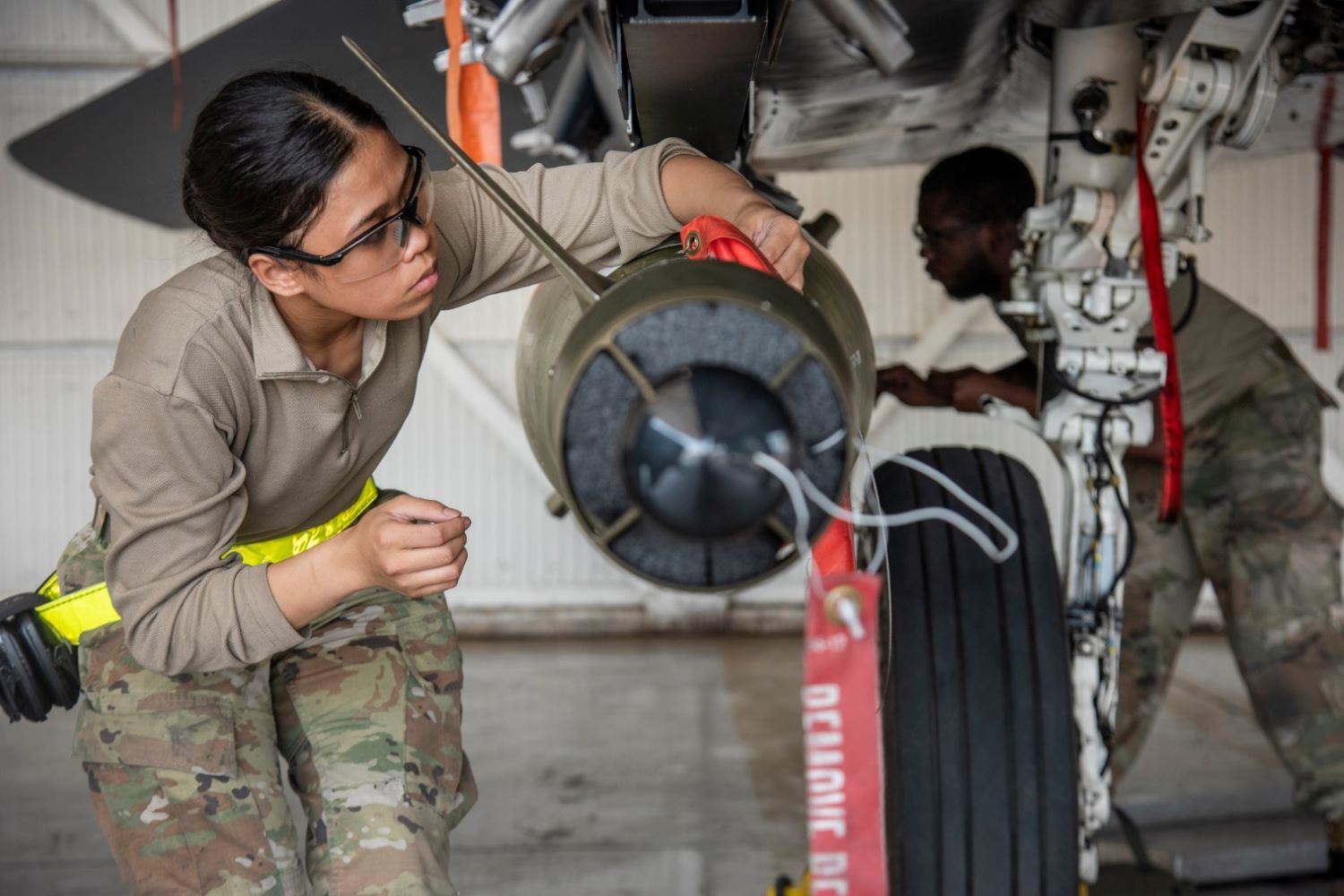 Soldiers are fixing the aircrafts