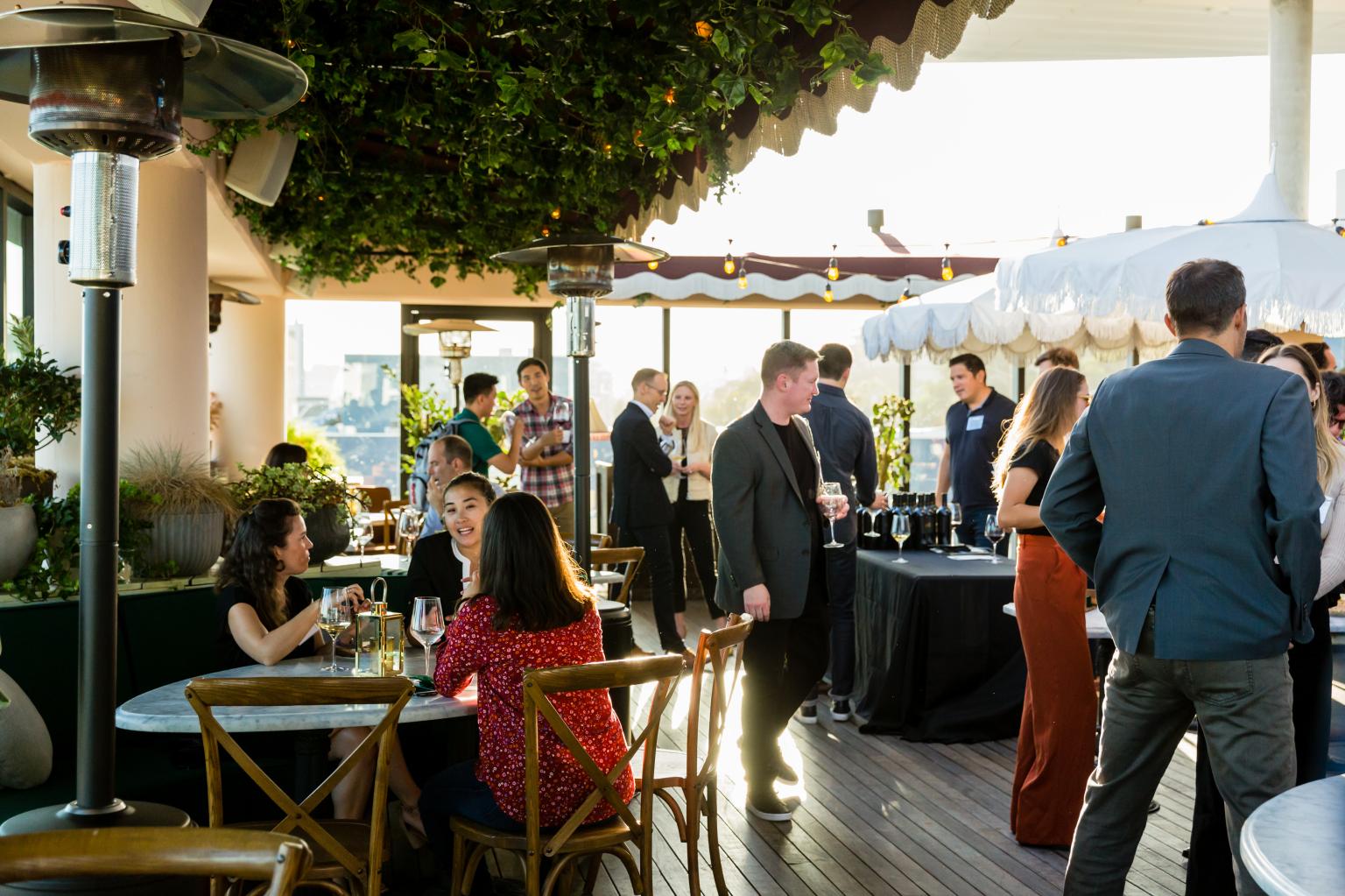 Greycroft staff and attendees in a social event