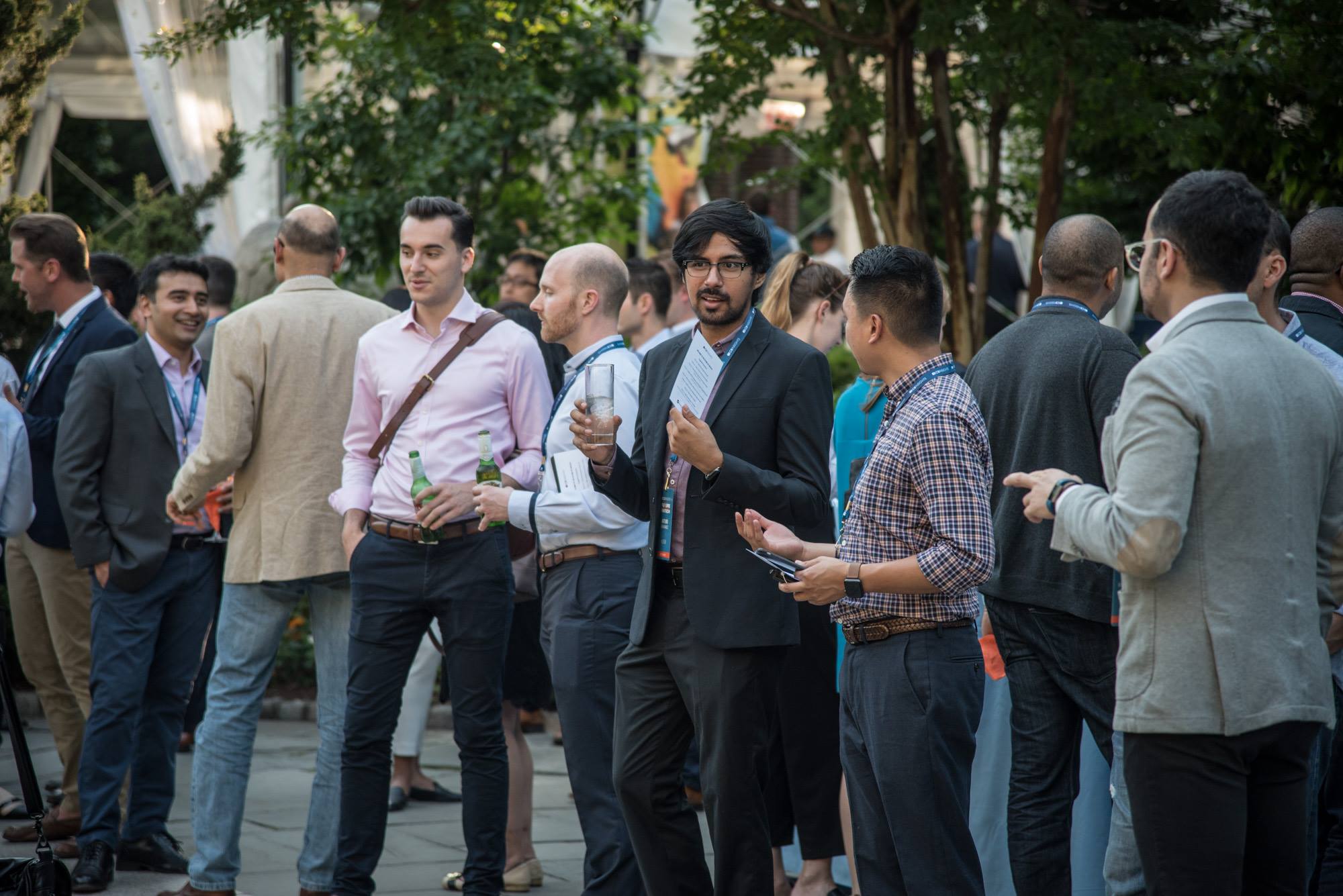 Conference attendees collaborate in a networking event