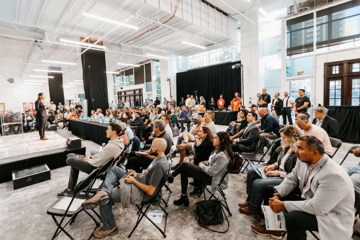 Tech founder speaks to the audience about their product