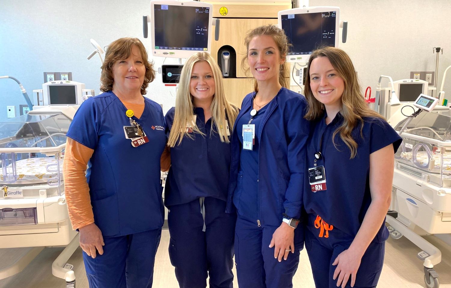 staff at HCA hospital collaborate in a lab