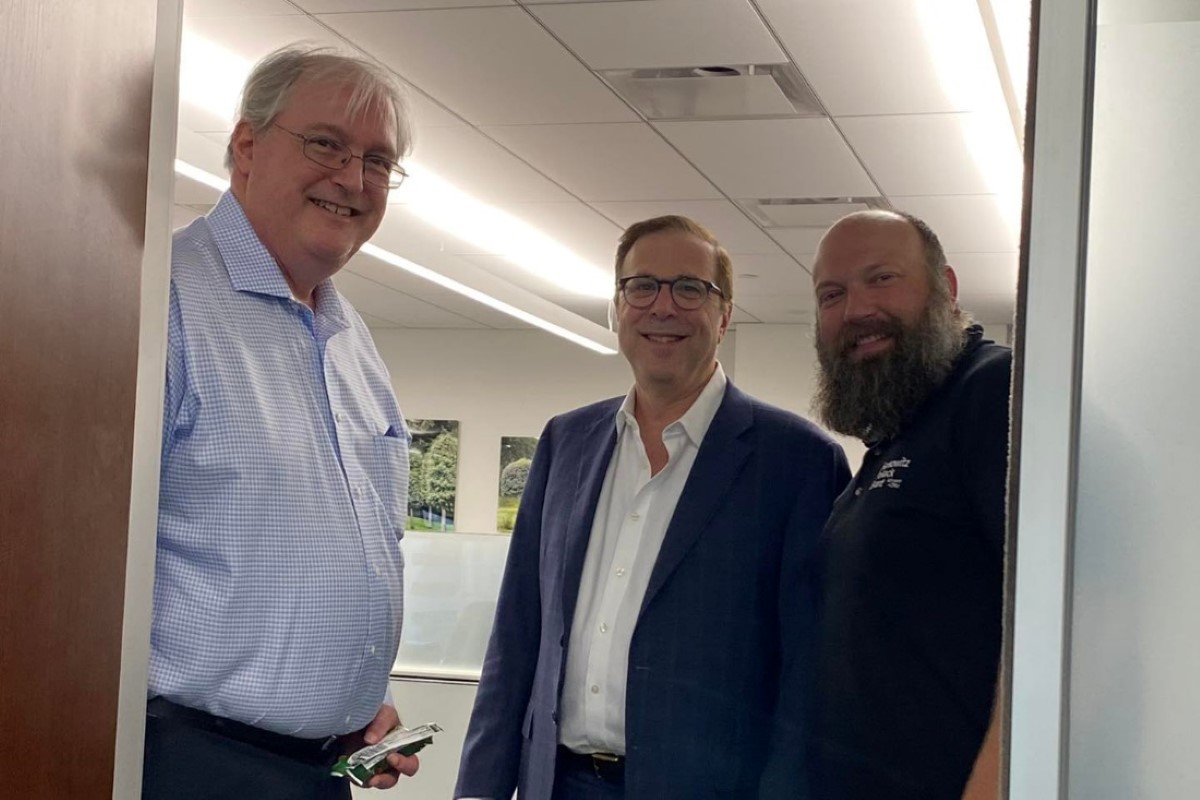 Leadership team from companies in a meeting