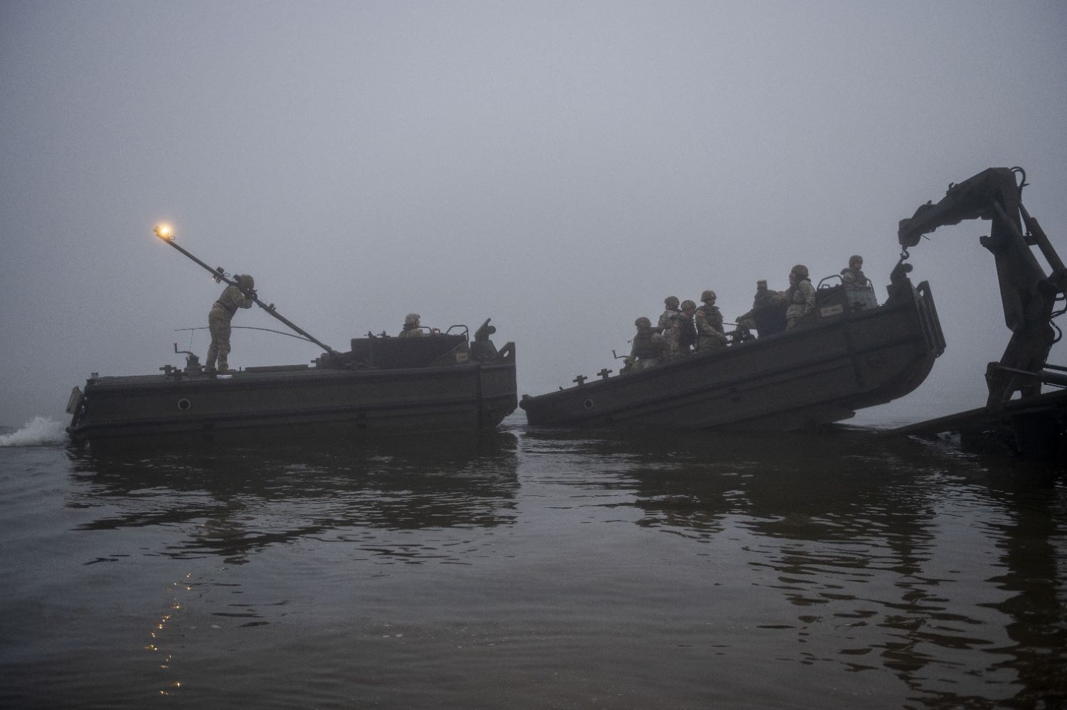 Army Soldiers from the 957th Engineer Company launched their boats into the Missouri River