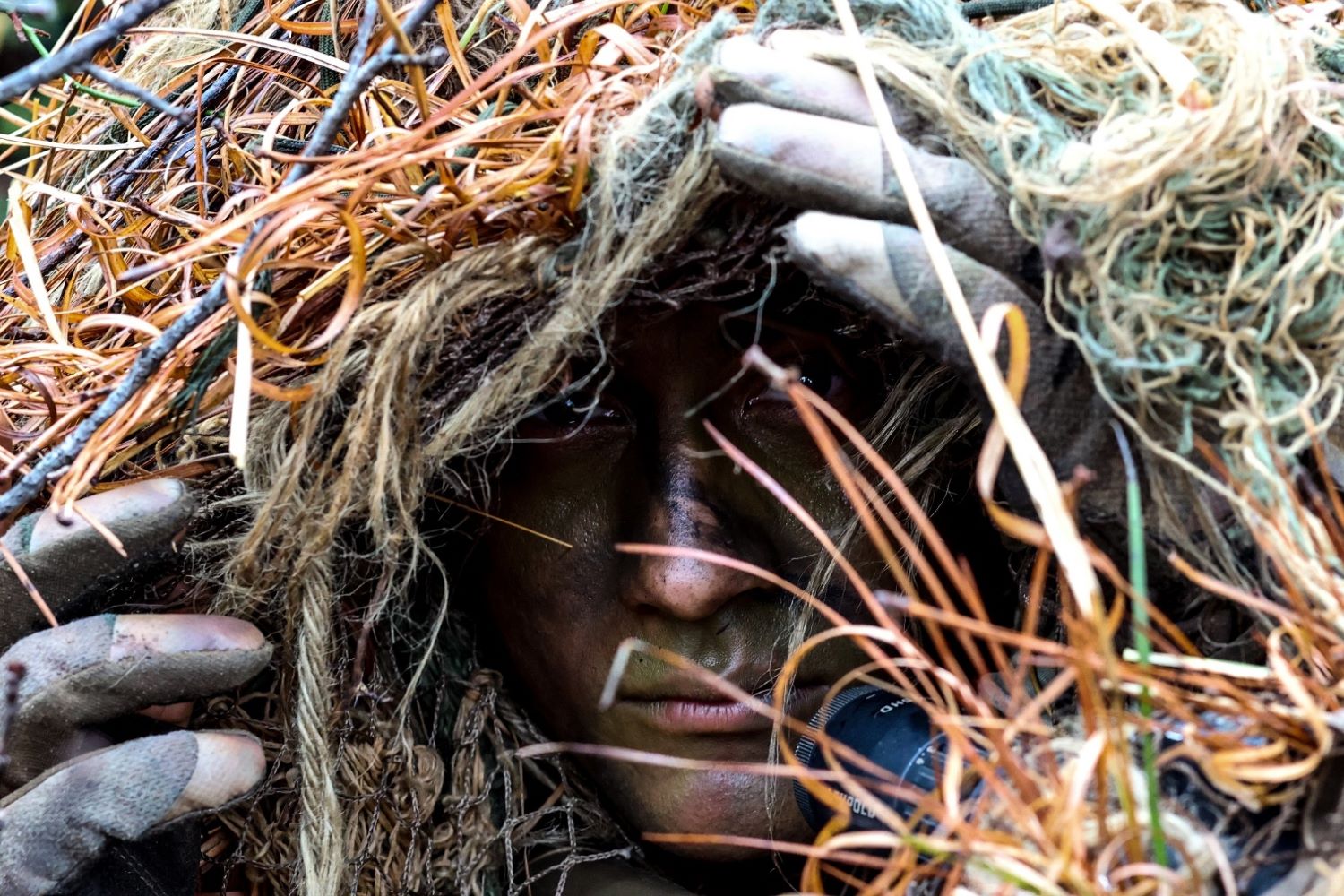 A Soldier from Sniper School Class 23-002 participates in stalk training