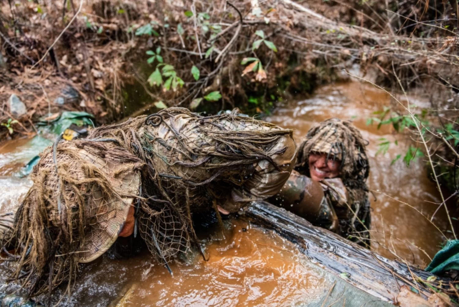 students participate in the ghillie wash