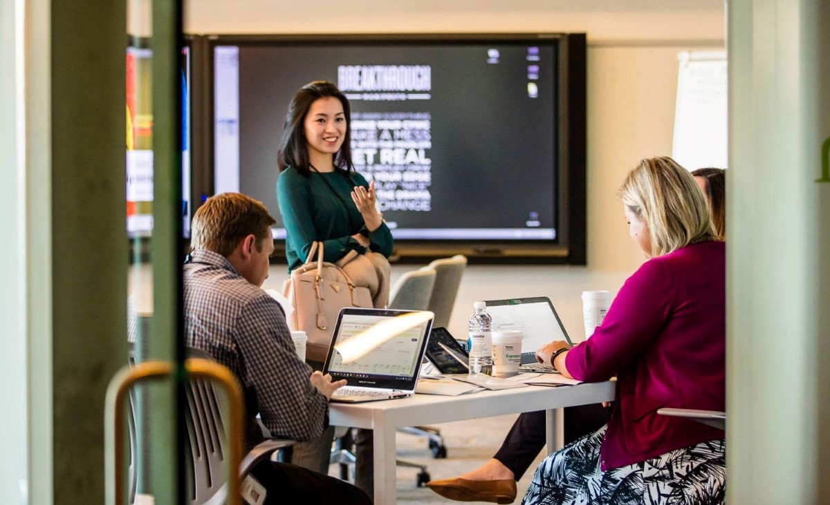 Deloitte staff work on project