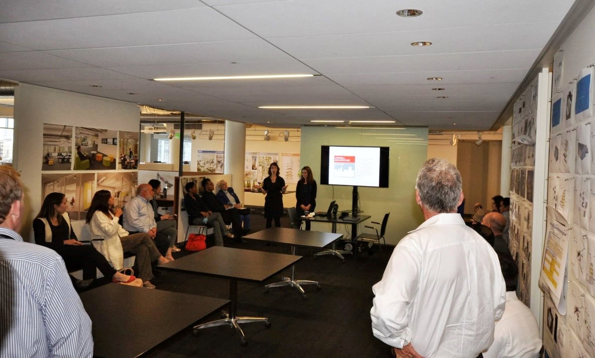 Architects, engineers and project managers collaborate in a workshop