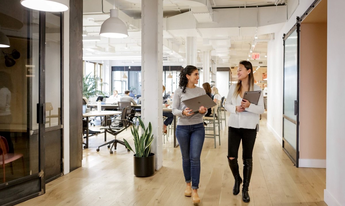 Riskified staff collaborate in the office