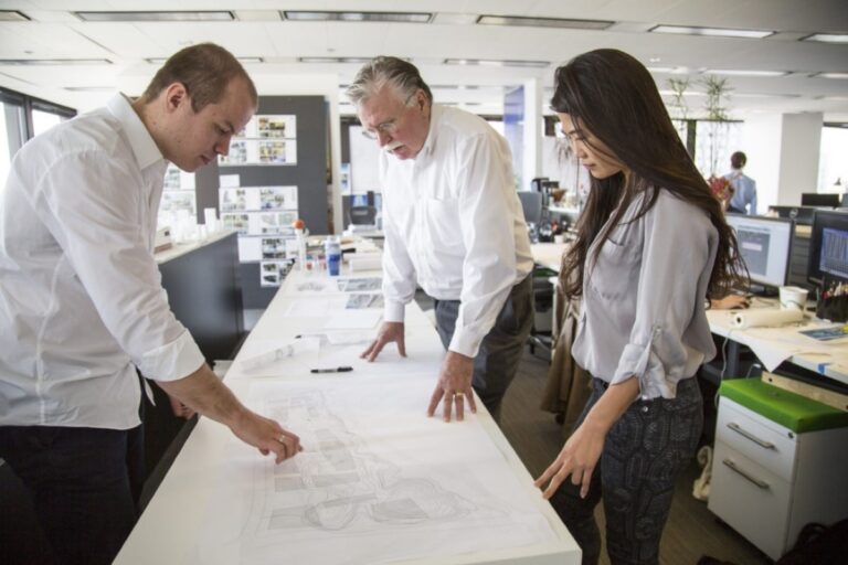 Perkins&Will project managers work on drawings
