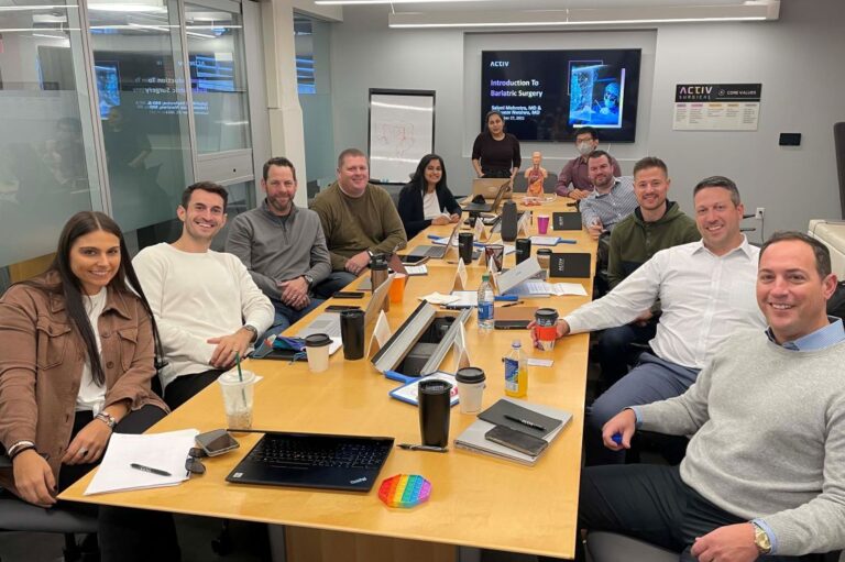 Activ Surgical engineers and marketing team in a meeting