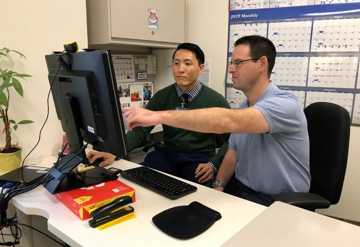 Kaiser Permanente physicians work on report