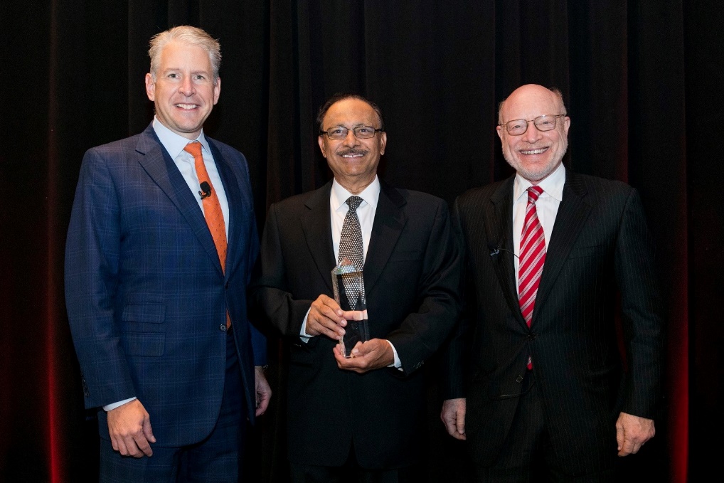 Prime Healthcare leaders and CEO in a conference