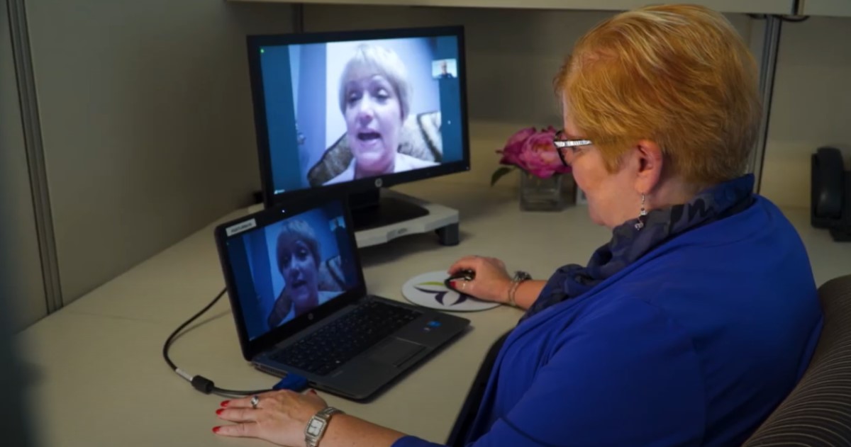 Trinity Health staff colaborate with patient via conference