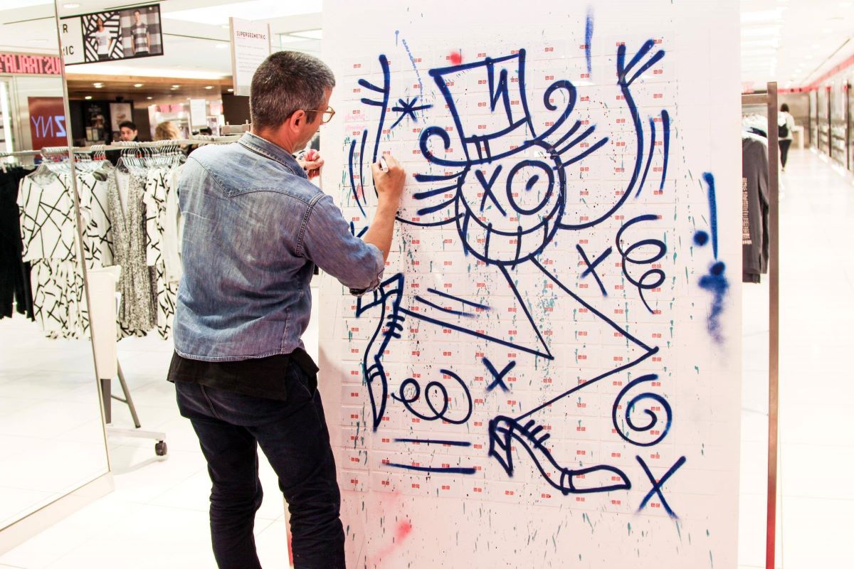 Uniqlo staff work on drawings