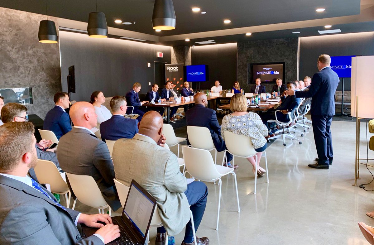 Root staff collaborate in a fintech event