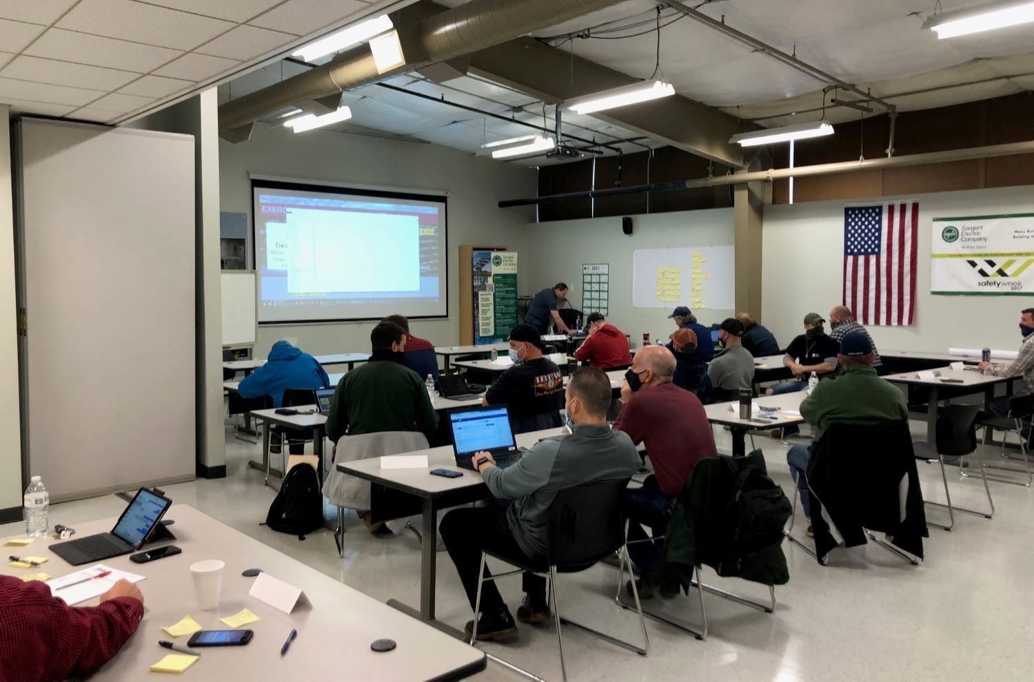 Sargent Electric staff in a technical workshop