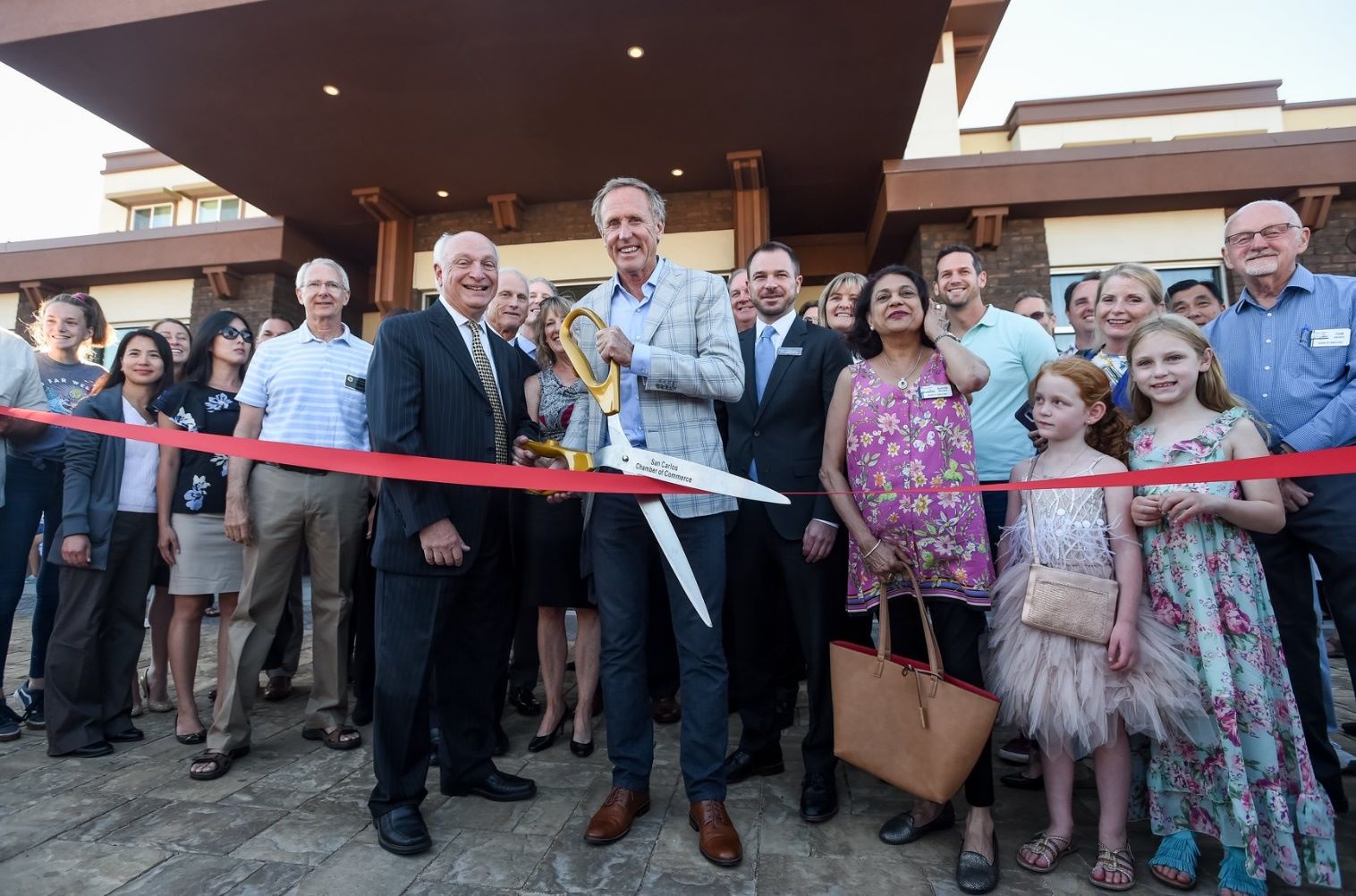 R.D Olson leadership and CEO in a ribbon cutting ceremony
