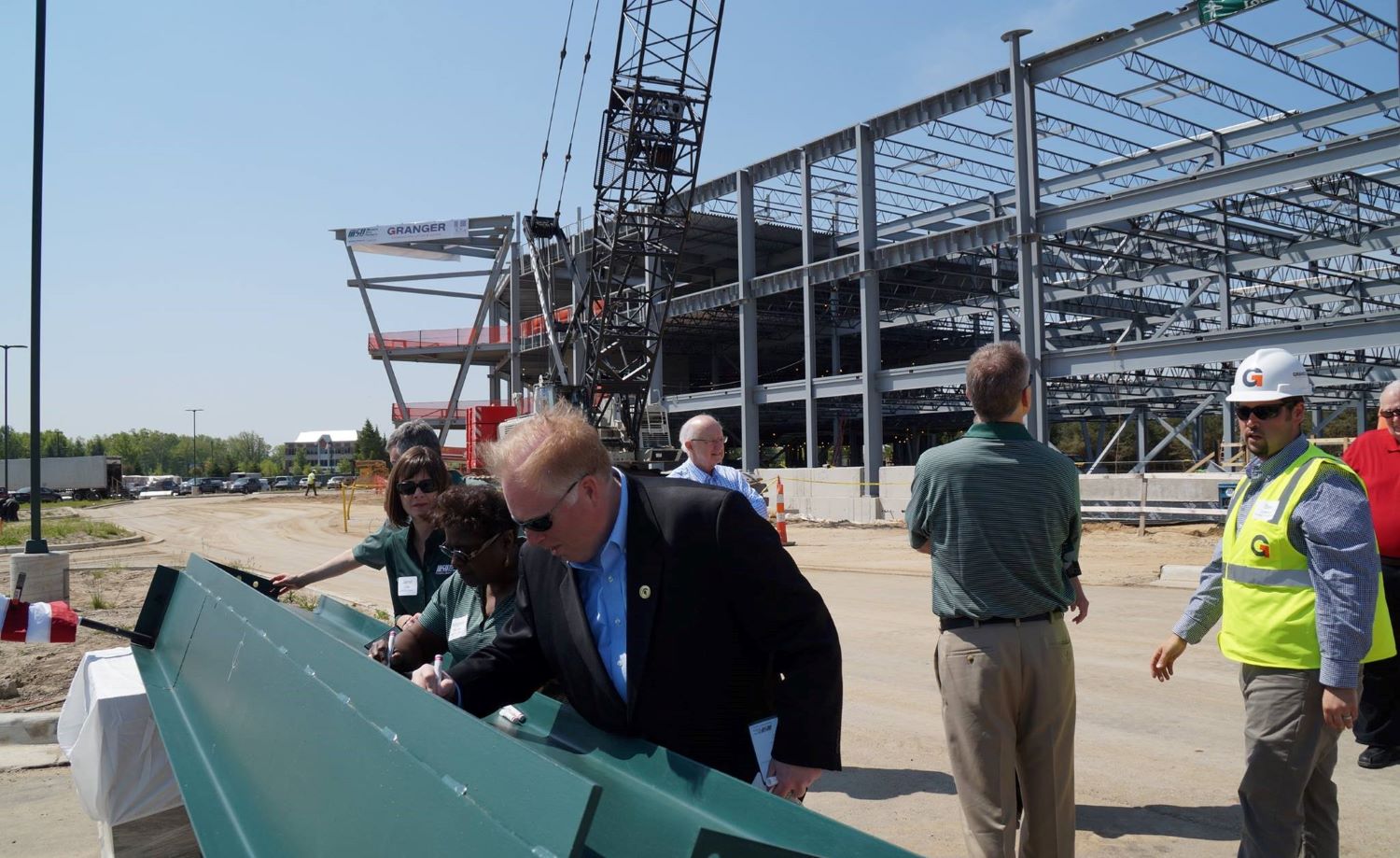 Granger Construction staff at a job site and inspect
