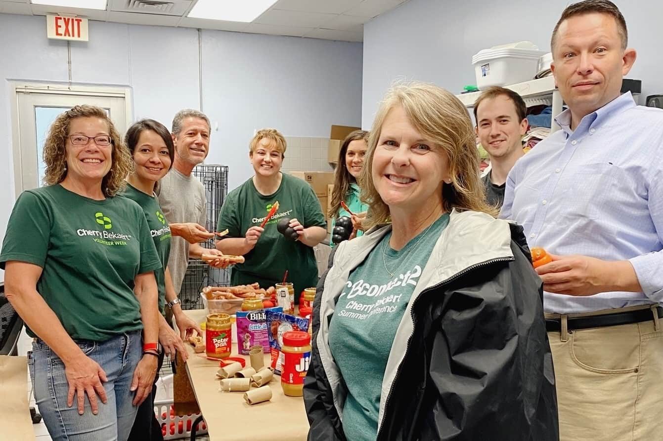 Cherry Bekaert CEO and her staff in lunch break
