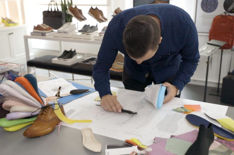 Cole Haan designer work on drawing