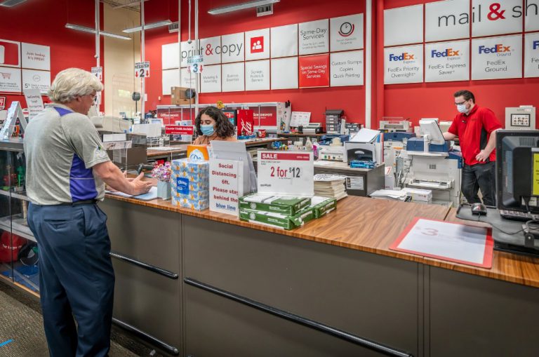 Customers checks in at Print and Copy station