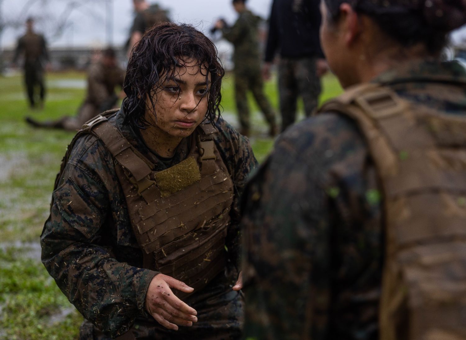 U.S. Marine Corps Pfc. Emlanie Gaona spars in a ground fighting match