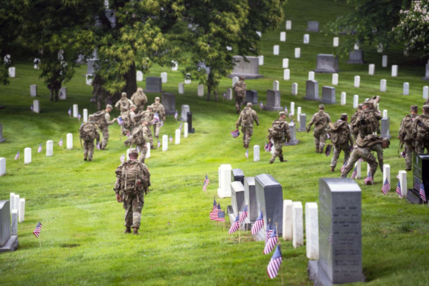 soldiers perform flags in tradition
