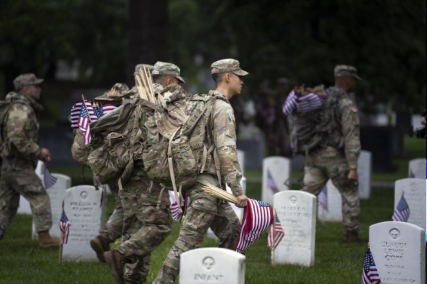 soldiers perform flags in tradition