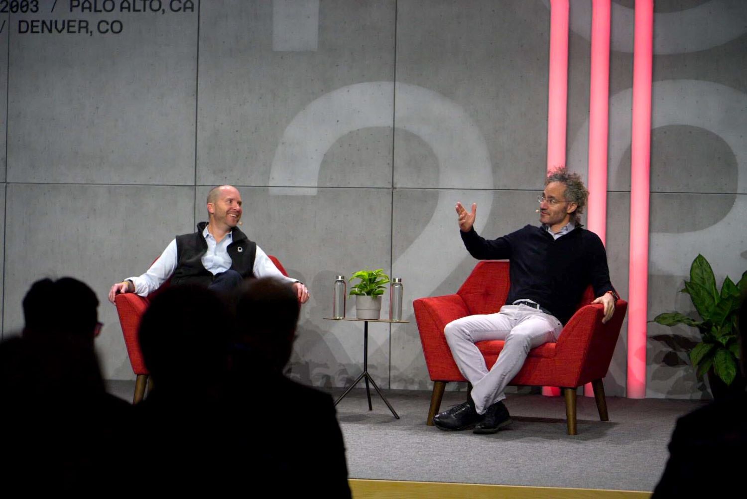 Alex Karp's in a conference