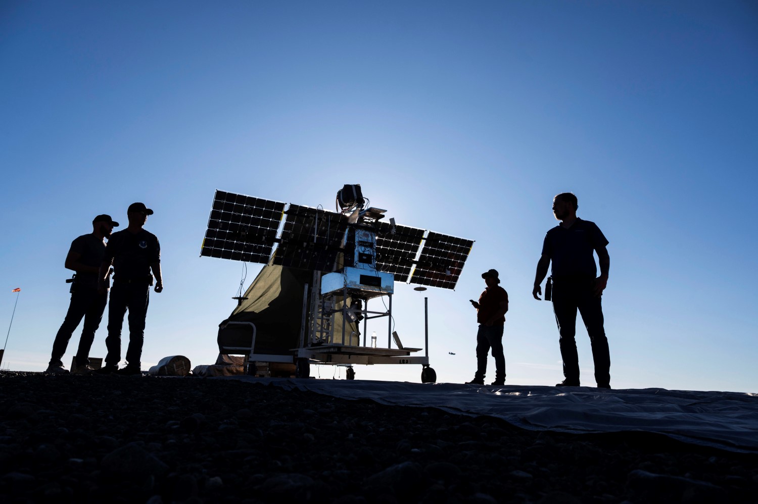 Soldiers operate a machine