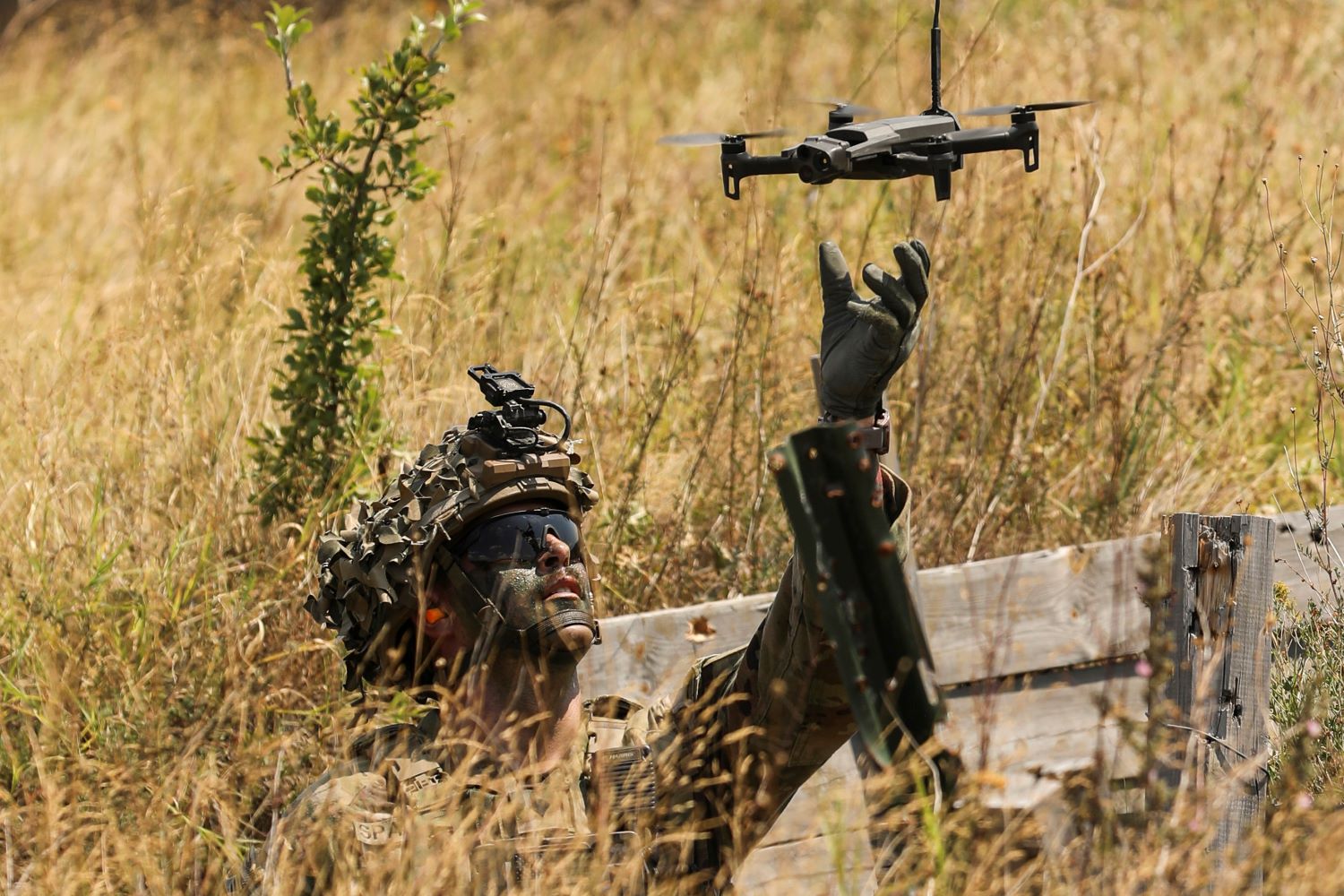 A soldier tests his drone