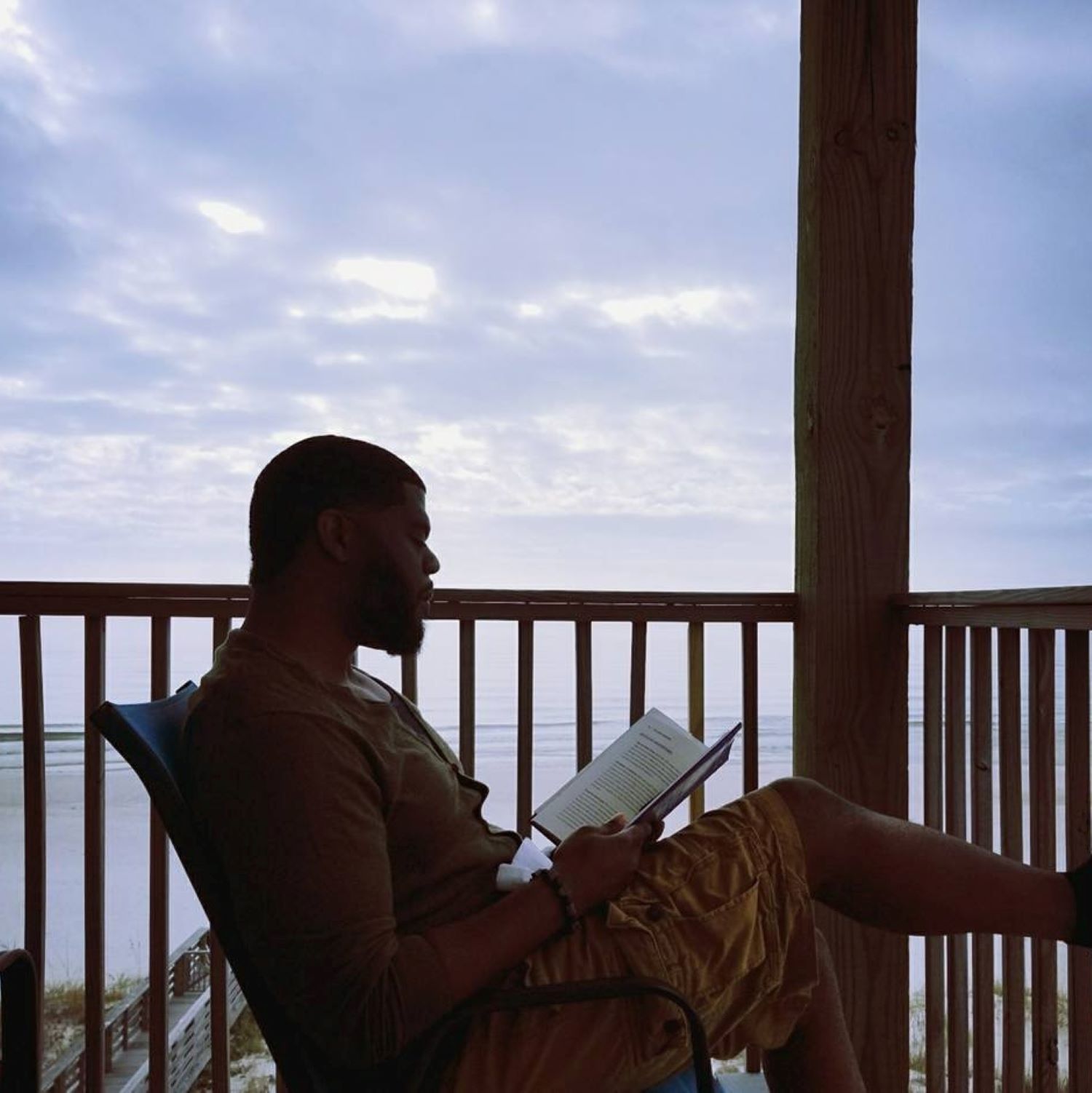 Curtis Wilson's reading a book